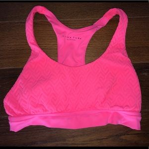 Trina Turk pink sports bra